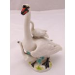 Meissen figural group of a Swan with two signets, marks to the base, 14cm (h)