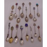 A quantity of hallmarked silver and white metal souvenir spoons (16)