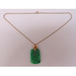 18ct gold and jade pendant on a 9ct gold chain