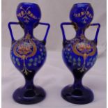 A pair of Victorian Bristol blue vases of waisted baluster form decorated with flowers and leaves on