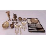 A quantity of hallmarked silver and white metal to include a cased set of tea knives and a cream