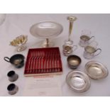 A quantity of silver plate to include a cake stand, bonbon dishes and coasters