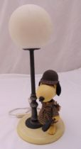 A novelty Snoopy desk lamp on raised circular base, 51cm (h)