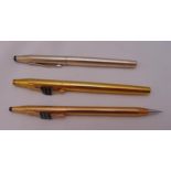 Two Cross fountain pens with 14ct gold nibs and a Cross propelling pencil