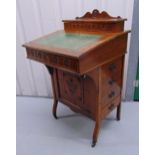 An Edwardian mahogany Davenport, rectangular with tooled leather hinged top above four drawers