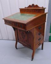 An Edwardian mahogany Davenport, rectangular with tooled leather hinged top above four drawers