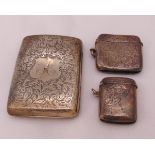 A hallmarked silver cigarette case and two hallmarked silver vesta cases, approx total weight 110g