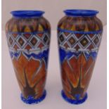 A pair of Chamelion ware polychromatic baluster vases, 22.5cm (h)