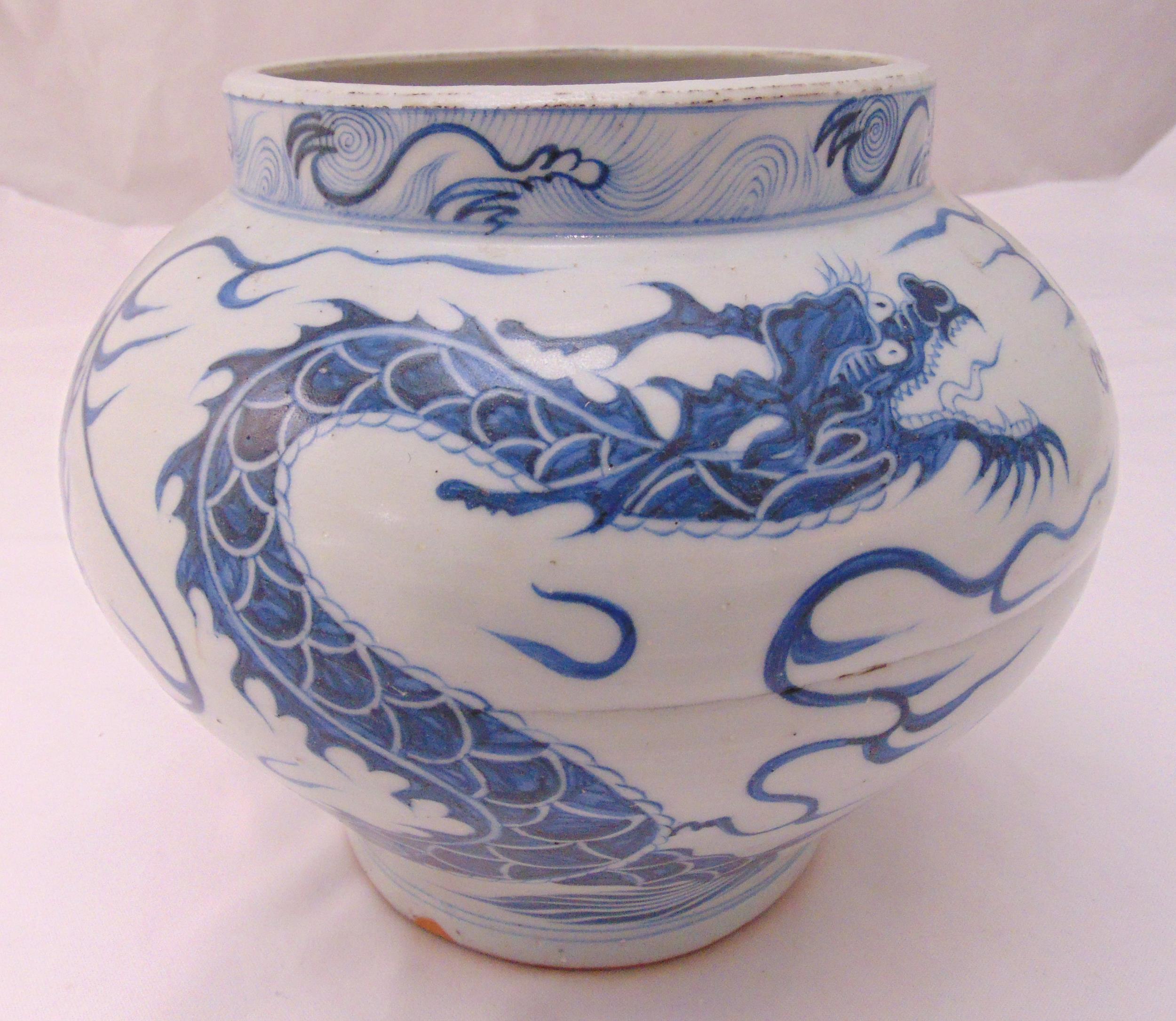 A Chinese blue and white baluster vase decorated with a Dragon, 21cm (h)