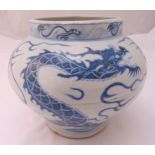A Chinese blue and white baluster vase decorated with a Dragon, 21cm (h)