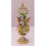 A continental baluster form porcelain vase and cover with applied flowers and leaves, cover A/F,