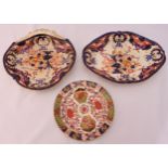 Three Crown Derby dishes decorated with flowers and leaves, 24cm and 17.5cm