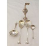 A quantity of hallmarked silver and white metal to include serving spoons, a strainer, a