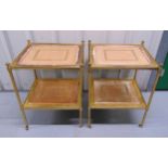 A pair of gilt metal and glass rectangular two tier side tables with tubular supports on brass