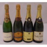 Four 75cl bottles of champagne to include Charles Heidsieck Private Reserve, Mercier Brut, Louis