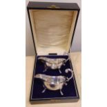 A pair of cased hallmarked silver sauce boats, Chester 1928, approx total weight of silver 144g