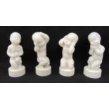 Four B & G Copenhagen blanc de chine figurines of children on raised bases, marks to the bases, 11cm