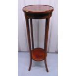 An Edwardian mahogany plant stand with inlaid top and base on four outswept rectangular legs, 96 x