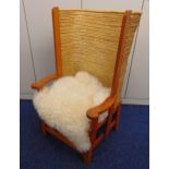 An early 20th century pine Orkney armchair, the classic shaped chair made from oat straw tied with