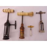 An English Thomason patent corkscrew with brass barrel and bone brush handle and three other vintage