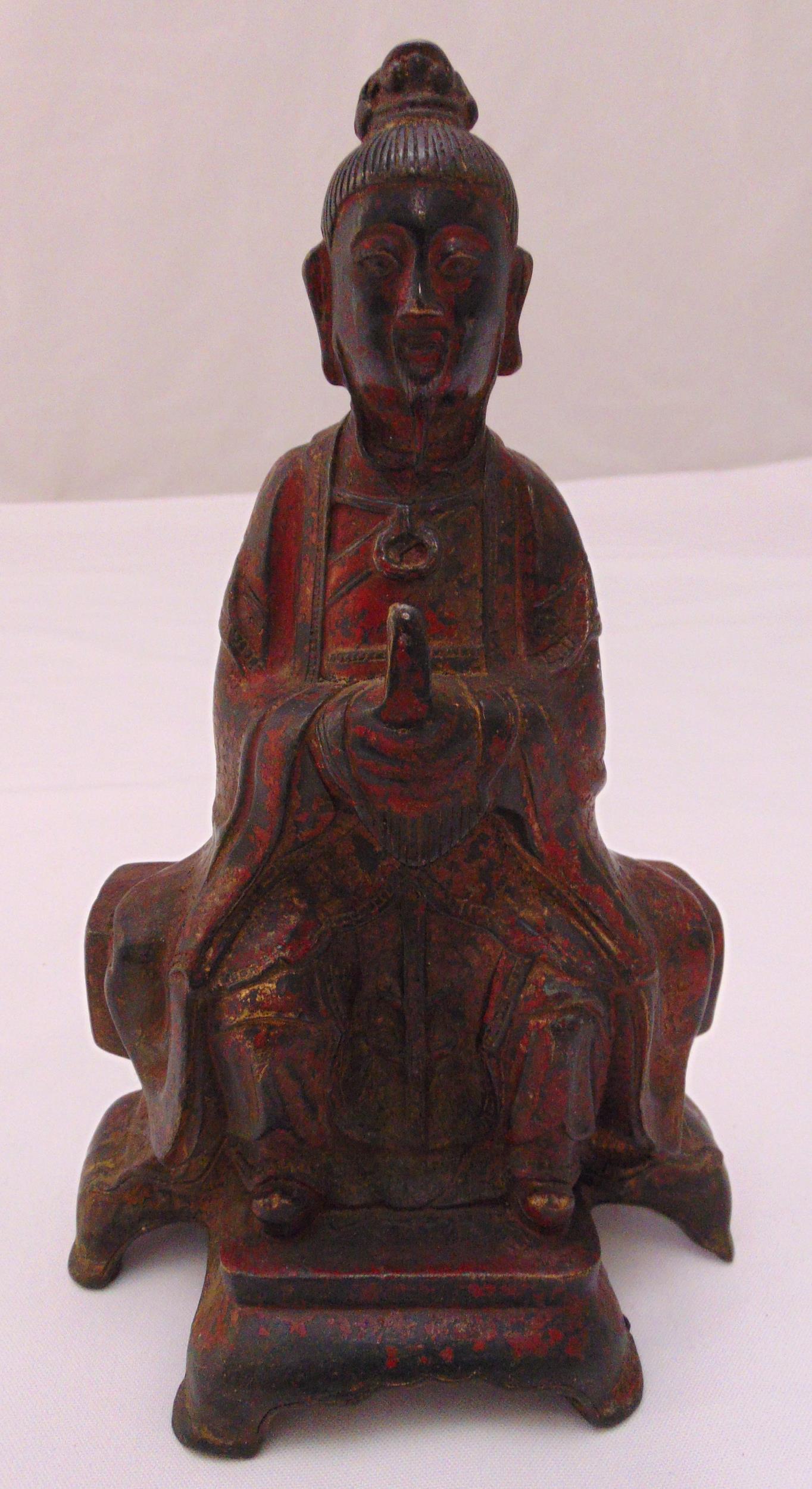 A Chinese bronze cold painted figurine of Buddha on raised shaped base, 24.5cm (h)