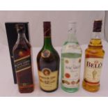 Four bottles of alcohol to include three bottles of whisky and a bottled rum