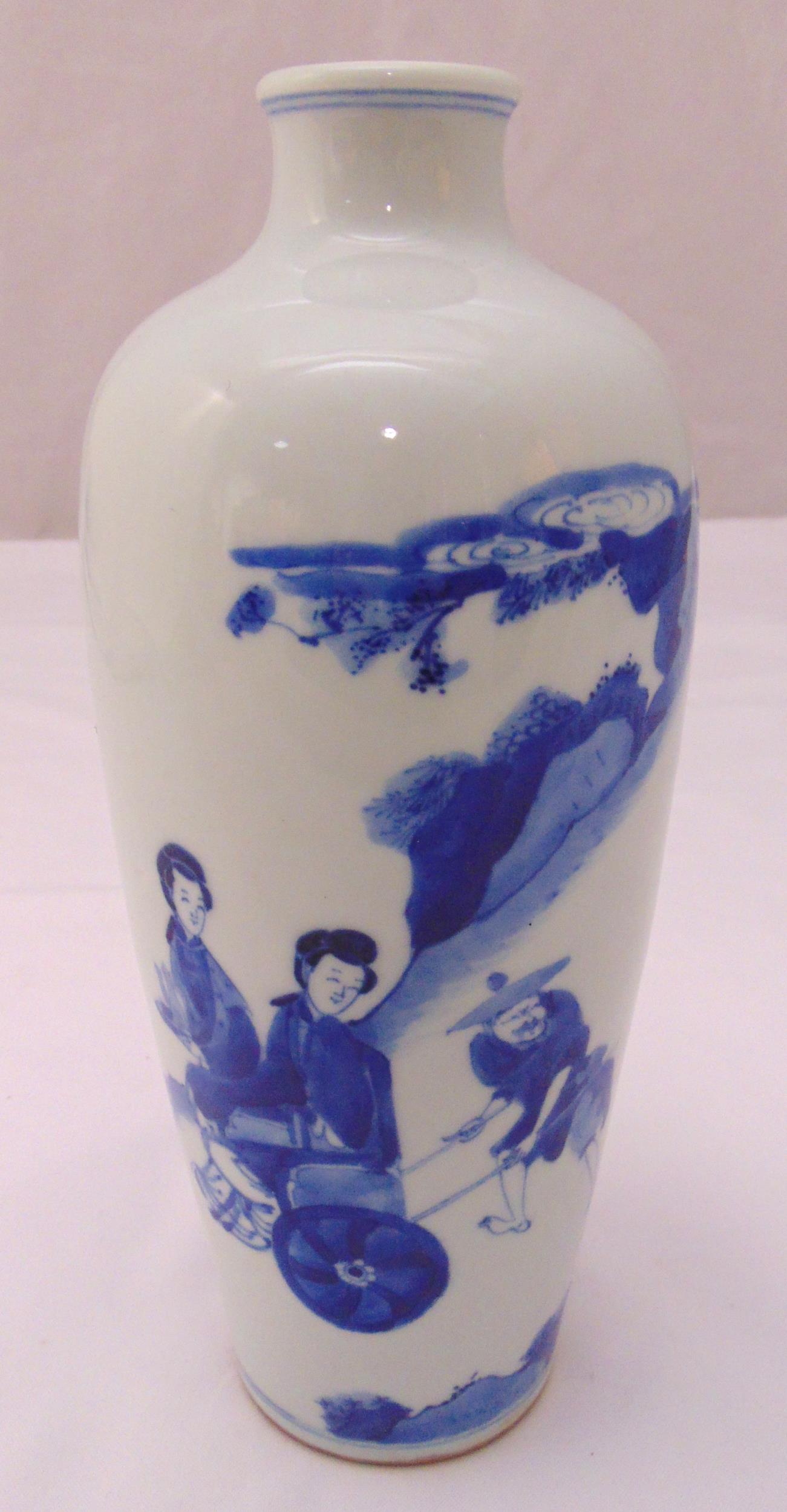 A Chinese blue and white baluster vase decorated with stylised figures, 26.5cm (h)