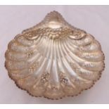 A hallmarked silver shell shaped dish on three ball feet, Sheffield 1903, approx total weight 307g