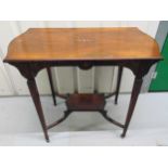 An Edwardian rectangular mahogany hall table with inlaid top and leg and original castors, 72.5 x