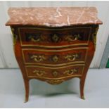 A French Louis XVI style chest of drawers, rectangular bow front with applied gilt metal