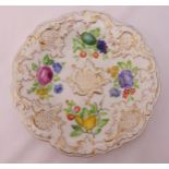 A Meissen plate decorated with flowers, fruit and gilded borders, 23cm (d)