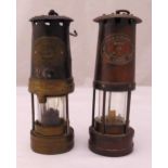 Two Thomas and Williams Ltd miners lamps of customary form, 26cm (h)