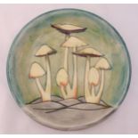Moorcroft plate decorated with mushrooms designed by Phillip Richardson, Fairy Rings Design, marks