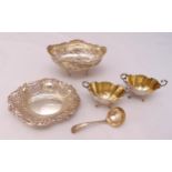 A quantity of hallmarked silver to include bonbon dishes, a pair of salts and a ladle, approx