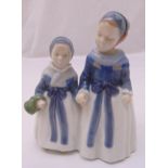 A Royal Copenhagen figurine (model number 1316) of sisters holding hands, marks to the base, 17cm (