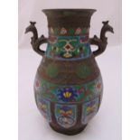 An oriental bronze and enamel baluster vase with stylised bird side handles on circular base,