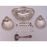 A quantity of hallmarked silver and white metal to include a pierced shaped oval dish, two shell