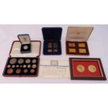 A quantity of cased coins and stamp sets to include Royal Hospital Chelsea commemorative double