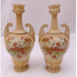 A pair of late 19th century Royal Dux blush ivory baluster vases decorated with flowers and leaves