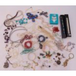 A quantity of costume jewellery to include necklaces, bracelets and earrings
