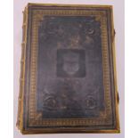 The Practical and Devotional Family Bible hardbound volume with gilded metal mounts