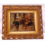 A framed reverse painted glass image of figures in a continental street scene, 25 x 19cm