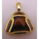 9ct yellow gold and tigers eye pendant, approx total weight 15.9g
