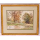 P.M. Pearce framed and glazed watercolour of a country landscape with lake and trees, signed