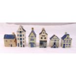 A quantity of blue and white Delft porcelain miniature houses to include Rynbende and KLM BOLS,
