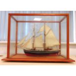 A large scale model of the Danish two-mast topsail schooner, Lilla Dan, the ship approx 65cm (w)