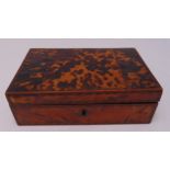 A tortoiseshell rectangular jewellery casket with hinged cover to reveal fitted interior, 8.5 x 27.5