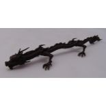 A Japanese bronze Okimono dragon, 15.5cm (w)