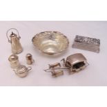 A quantity of white metal to include a bonbon dish, miniature condiments, a dressing table glass