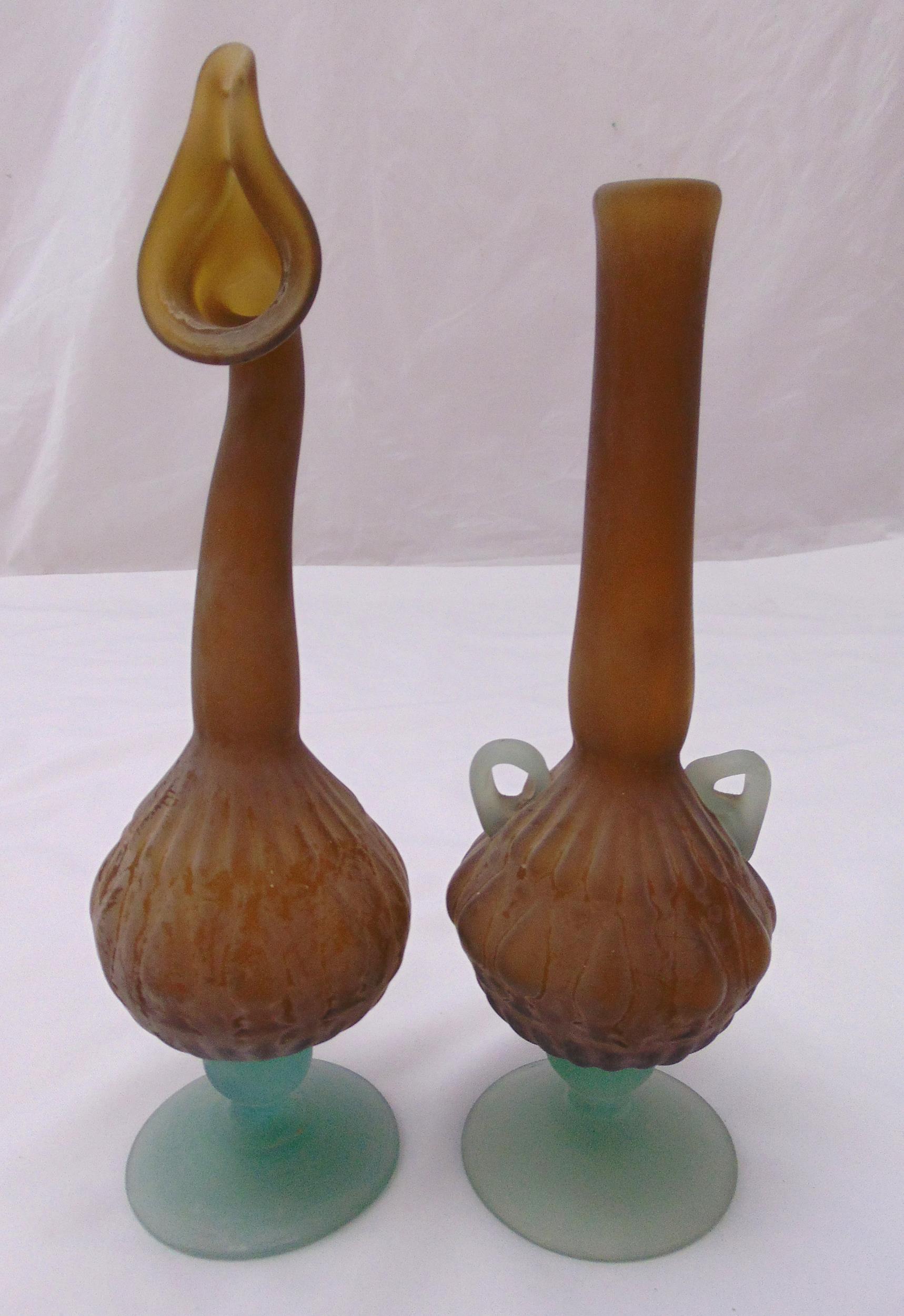 Two middle eastern early 20th century glass vases on circular spreading bases, 34cm (h)